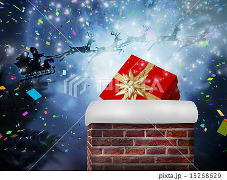 Composite image of santa flying his sleigh behind chimney 13268629