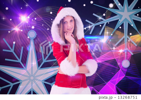 Composite image of festive brunette smiling at camera 13268751