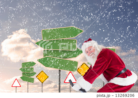 Composite image of santa uses a home trainer 13269206