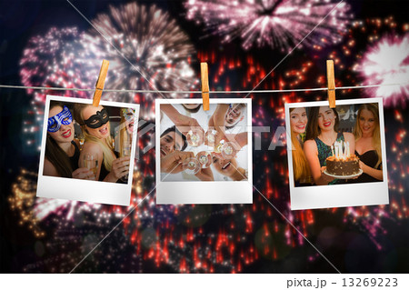 Composite image of happy friends celebrating brithday one holdin 13269223