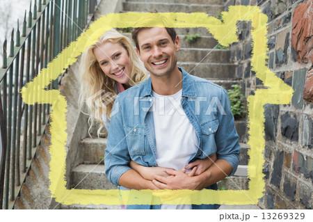 Composite image of hip young couple sitting on steps smiling at Composite image of hip young couple sitting on steps smiling at 13269329