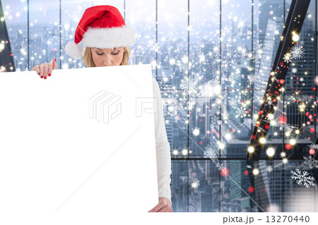 Composite image of festive blonde showing poster 13270440