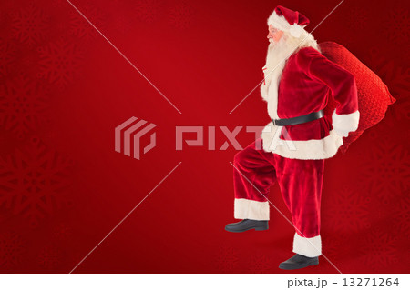 Composite image of santa jumps with his bag 13271264