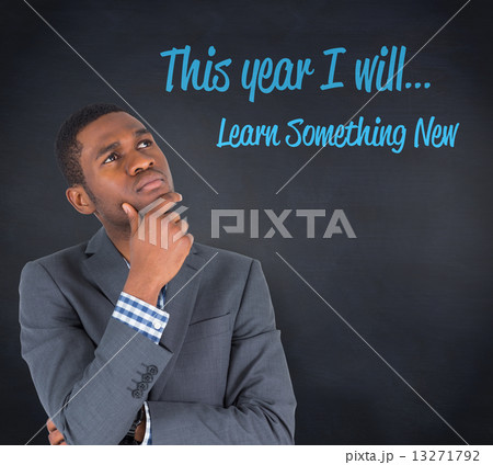 Composite image of young businessman thinking 13271792