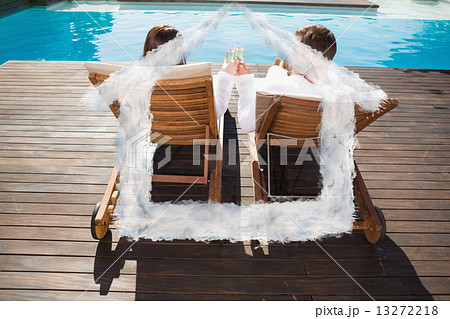 Composite image of couple toasting champagne by swimming pool Composite image of couple toasting champagne by swimming pool 13272218