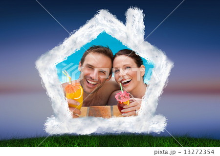 Composite image of beautiful couple drinking cocktails in the sw Composite image of beautiful couple drinking cocktails in the sw 13272354