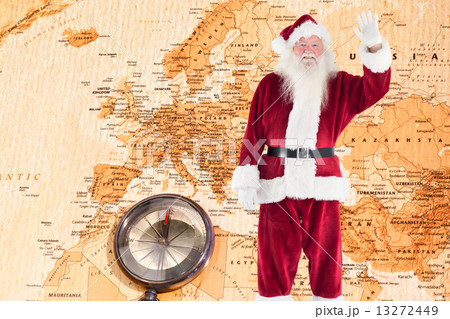 Composite image of jolly santa waving at camera 13272449