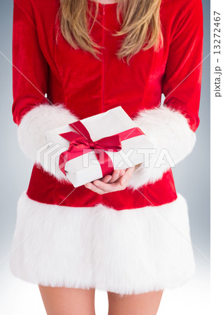 Sexy santa girl holding gift Sexy santa girl holding gift 13272467