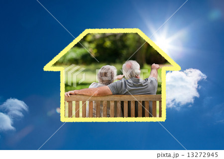 Composite image of couple sitting on the bench with their back t Composite image of couple sitting on the bench with their back t 13272945