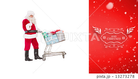 Composite image of positive santa delivering gifts with a trolle 13273278