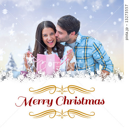 Composite image of happy couple with shopping bags 13273557