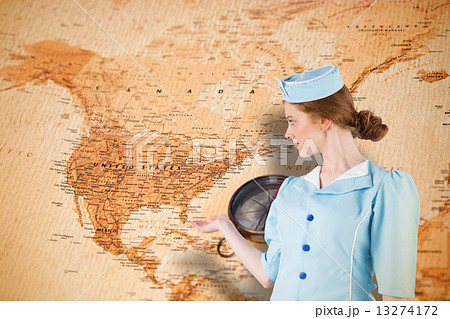 Composite image of pretty air hostess presenting with hand 13274172
