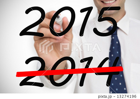 Composite image of businessman writing on camera with a black ma Composite image of businessman writing on camera with a black ma 13274196