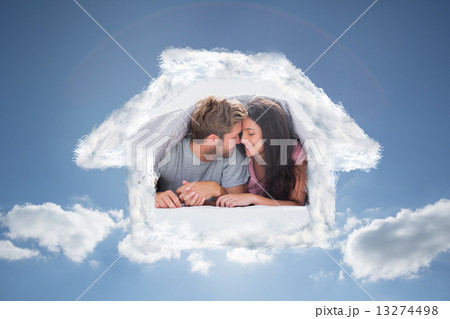 Composite image of cheerful couple head against head under the d Composite image of cheerful couple head against head under the d 13274498