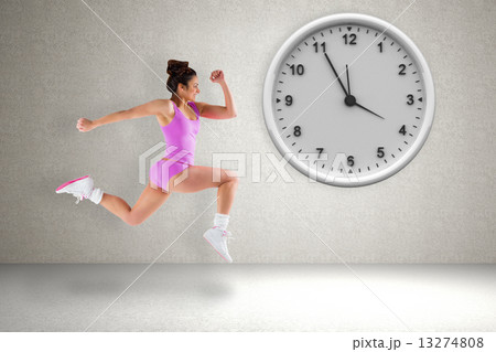 Composite image of fit brunette running 13274808