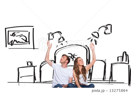 Composite image of happy young couple with hands raised 13275864