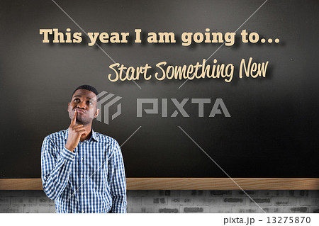 Composite image of young businessman thinking 13275870