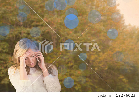 Composite image of pretty blonde getting a headache Composite image of pretty blonde getting a headache 13276023