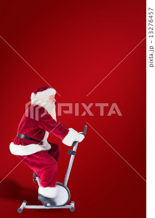 Composite image of santa uses a home trainer Composite image of santa uses a home trainer 13276457