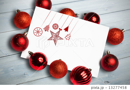 Composite image of hanging red christmas decorations Composite image of hanging red christmas decorations 13277458