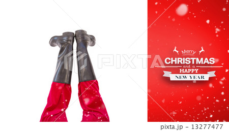 Composite image of lower half of santas legs with his black boot 13277477
