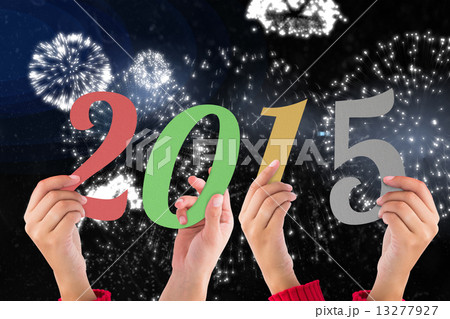 Composite image of hands holding poster Composite image of hands holding poster 13277927