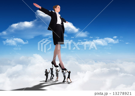 Composite image of business people supporting boss 13278921