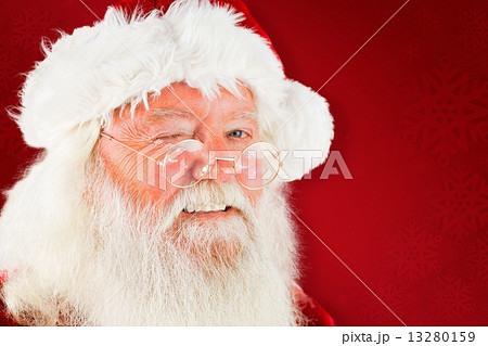 Composite image of santa claus winking Composite image of santa claus winking 13280159