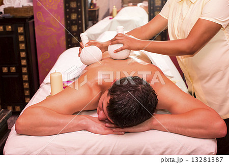 man engaged in Ayurvedic spa treatment man engaged in Ayurvedic spa treatment 13281387