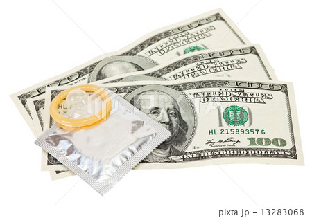 Condom with money on white Condom with money on white 13283068