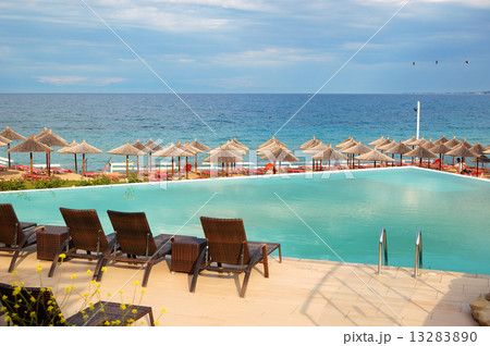 Swimming pool by a beach at the modern luxury hotel, Halkidiki, Swimming pool by a beach at the modern luxury hotel, Halkidiki, 13283890