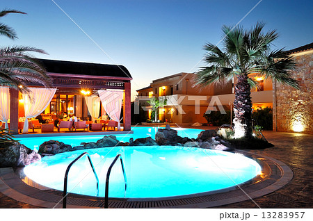 Outdoor restaurant during sunset at the luxury hotel, Pieria, Gr Outdoor restaurant during sunset at the luxury hotel, Pieria, Gr 13283957