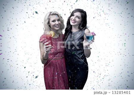 Composite image of friends drinking cocktails 13285401