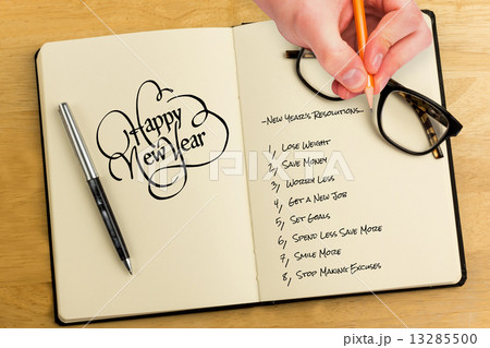 Composite image of hand writing with a pencil Composite image of hand writing with a pencil 13285500