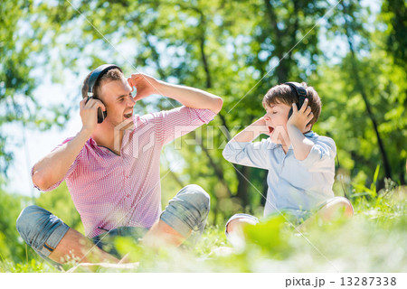 Father and son in park 13287338