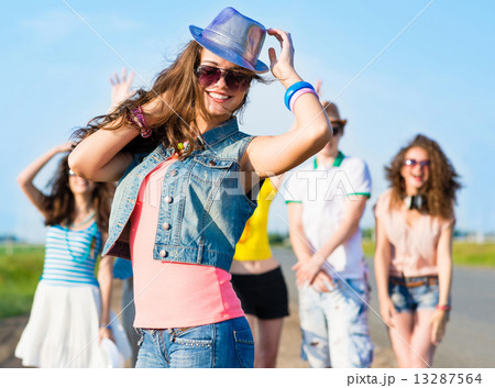 stylish young woman in sunglasses 13287564