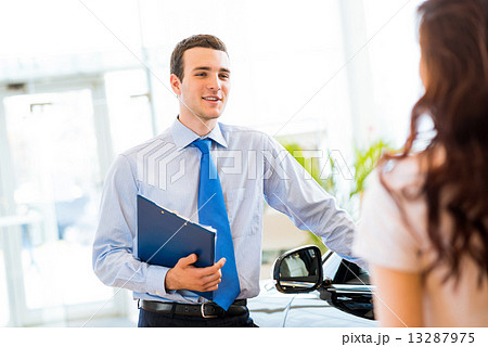sales manager at a showroom car 13287975