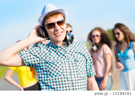 young man in sunglasses young man in sunglasses 13288281