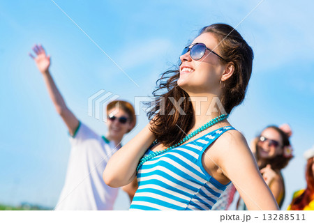 stylish young woman in sunglasses 13288511