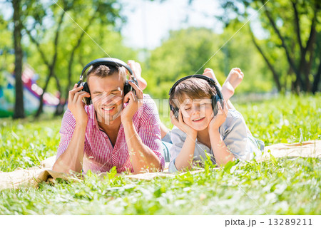 Father and son in park Father and son in park 13289211
