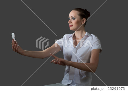 business woman holding a cell phone business woman holding a cell phone 13291973