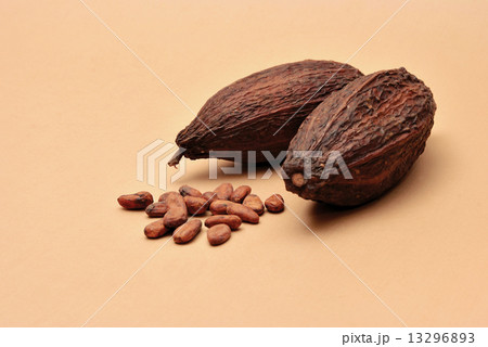 Cocoa beans on a brown background Cocoa beans on a brown background 13296893