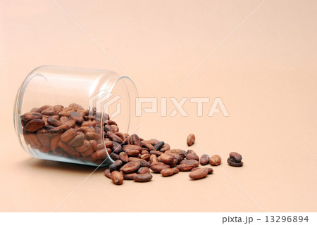 Cocoa beans on a brown background Cocoa beans on a brown background 13296894