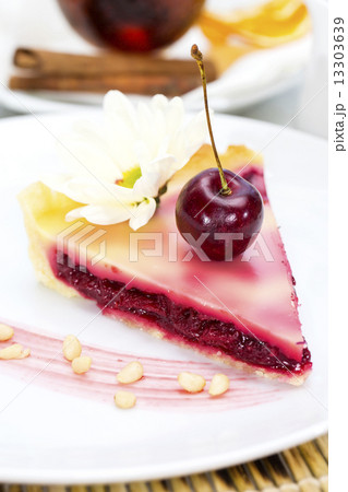 piece of cherry pie on a table in a restaurant 13303639