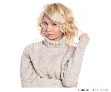 Beautiful, young woman in a warm sweater Beautiful, young woman in a warm sweater 13305290