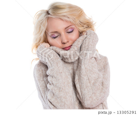 Beautiful, young woman in a warm sweater 13305291