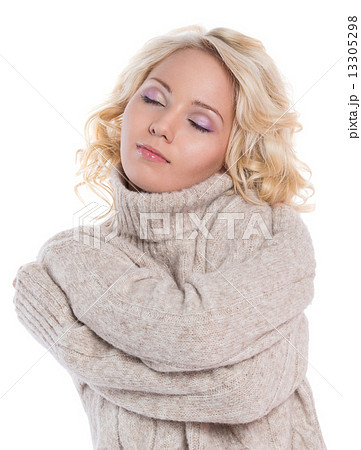Young woman in a warm sweater 13305298