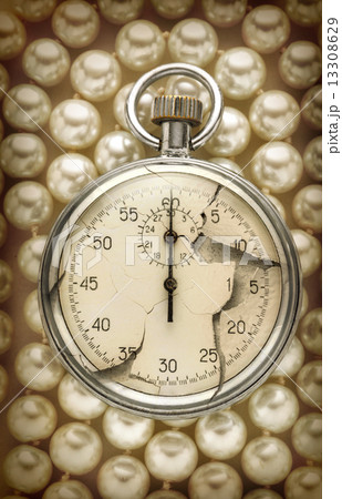 Cracked stopwatch on white pearl 13308629