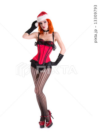 Burlesque girl in red corset and Santa Claus hat 13309793