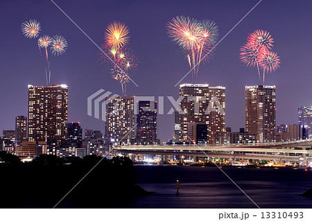 Fireworks celebrating over Odaiba, Tokyo cityscape at night 13310493